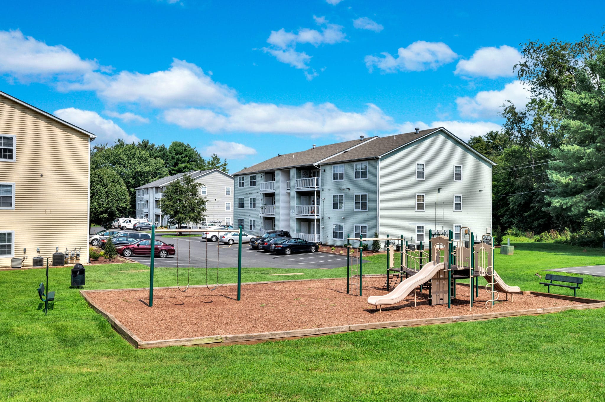 playground and parking lot | Spark Culpeper apartments