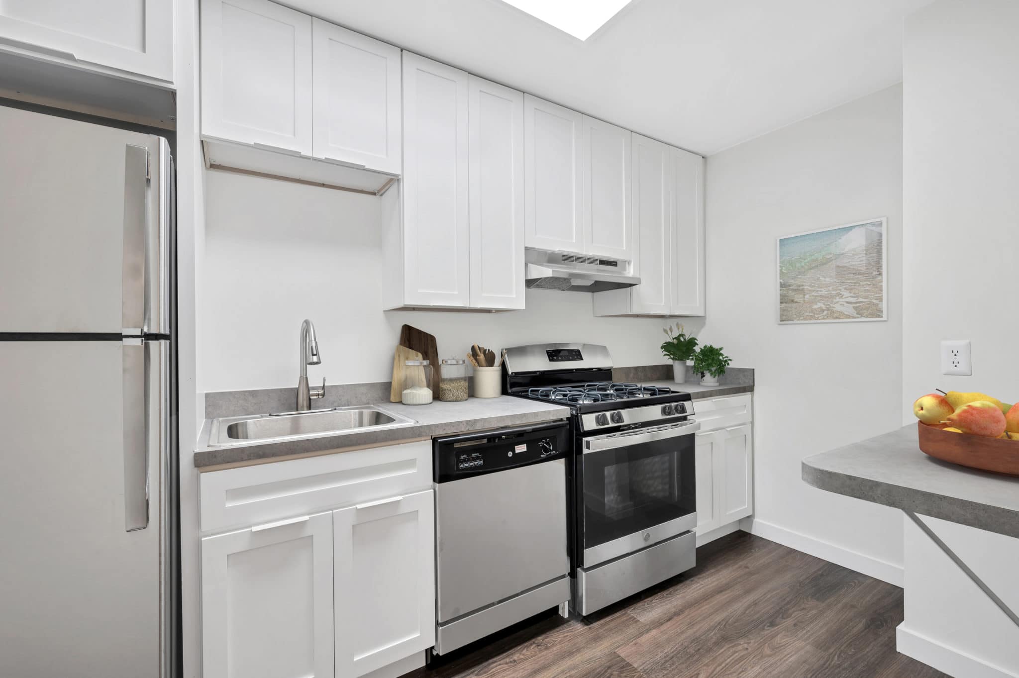 kitchen with white cabinets and stainless steel appliances | Spark Oxon Hill Apartments