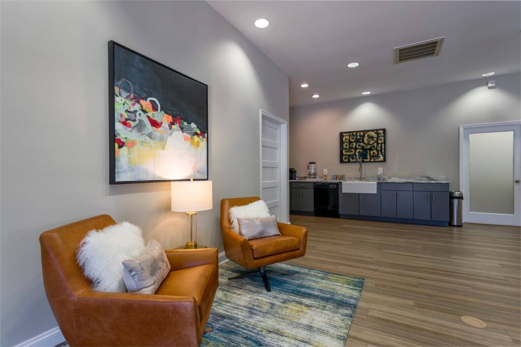 two leather chairs in resident lounge area | Spark Waldorf Apartments