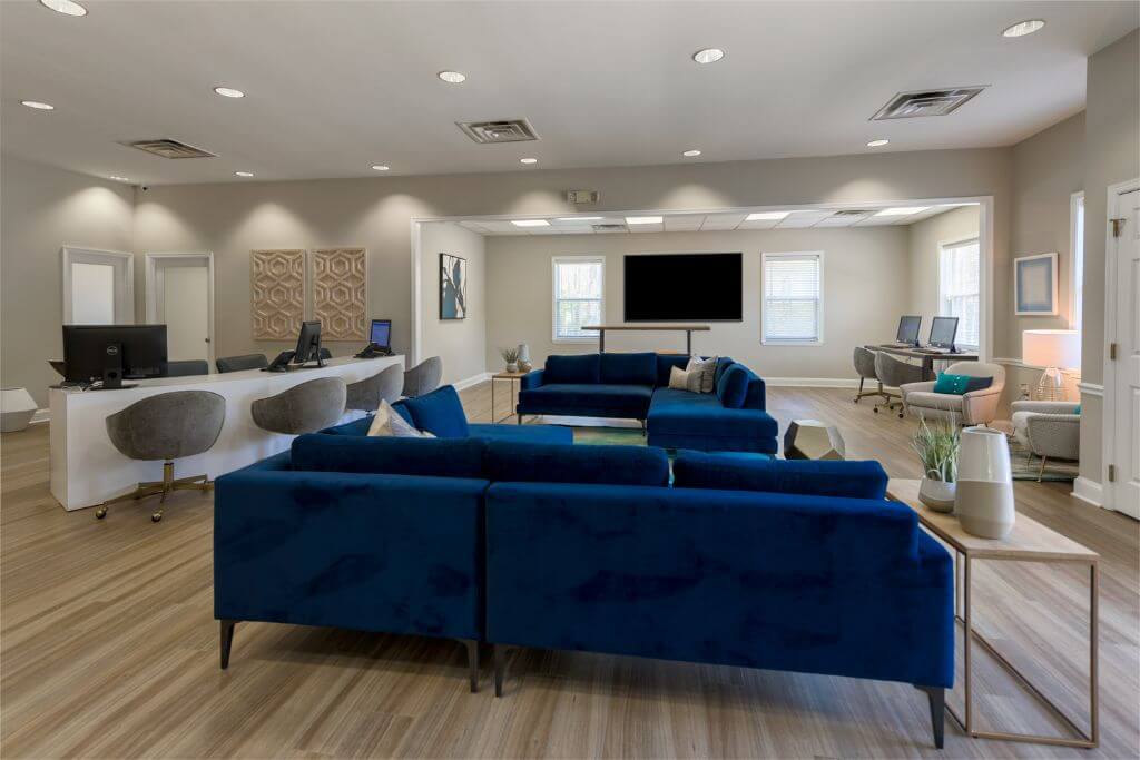 resident lounge with couches | Spark Waldorf Apartments