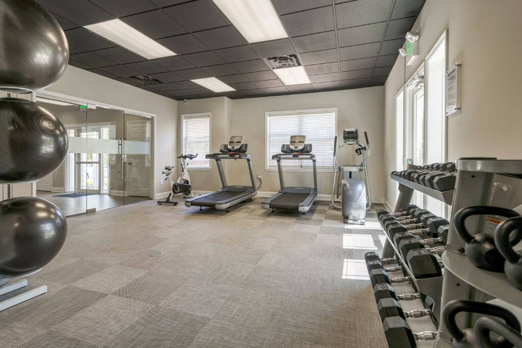 fitness center with treadmills | Spark Waldorf Apartments